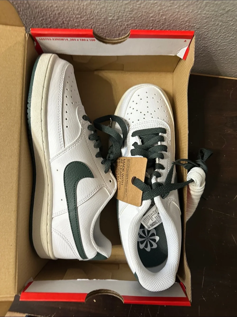 Nike White Low-Top Sneakers with Dark Green Swoosh and Heel